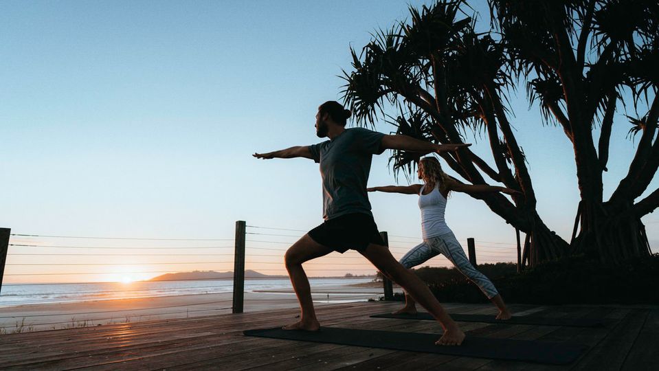 Sunrise yoga on the deck near the Beach Lounge.. Destination NSW