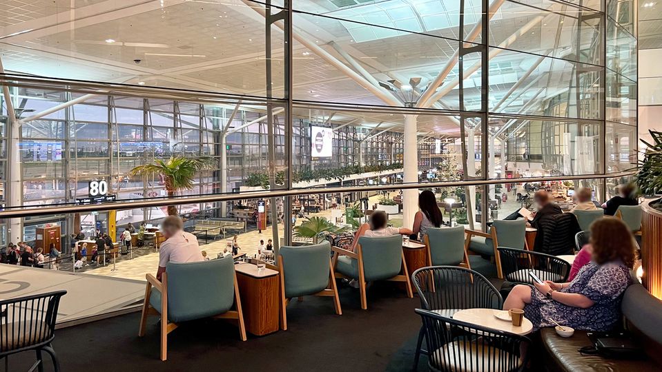 The Qantas Lounge looks down across the main departures hall.