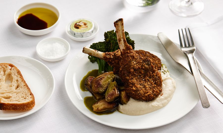 First class: Crumbed Margra lamb cutlets with broccolini, brussel sprouts and celeriac puree.