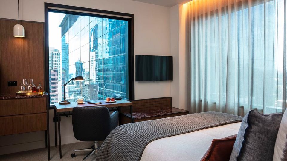 Office with a view: Next Hotel Melbourne cleverly places a proper desk up against a window nook.
