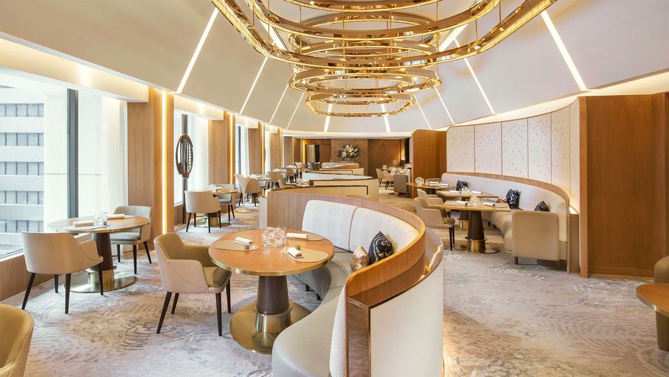 The lavish dining room at two Michelin-starred Amber, within the Mandarin Oriental.