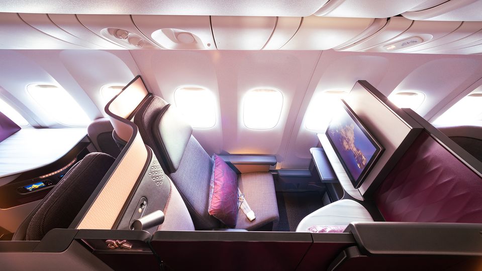 Qsuite business class has a 21.5-inch screen on which to enjoy 4000+ programs.