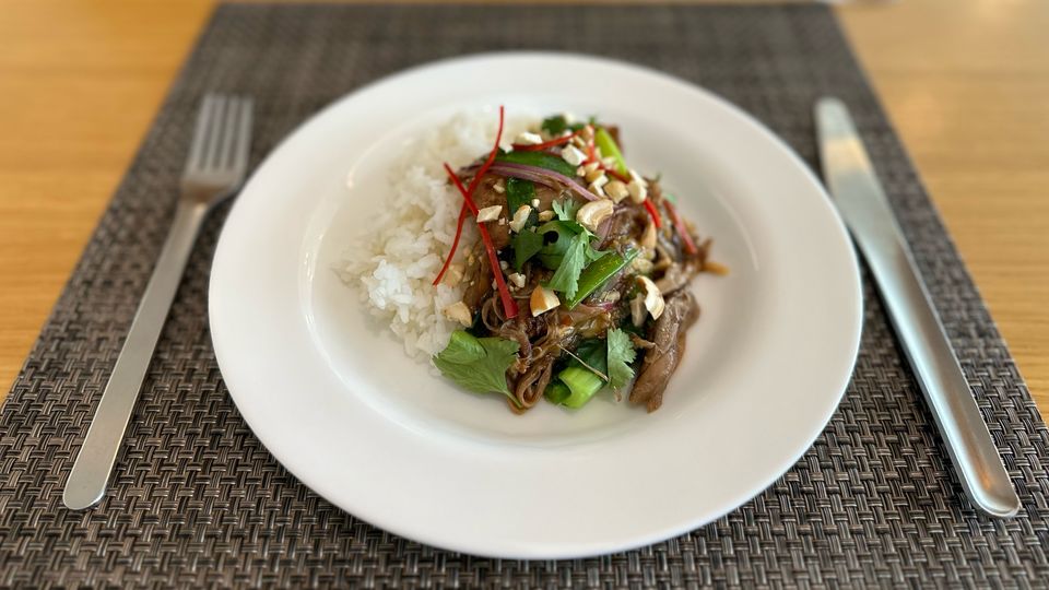 Qantas First Lounge Winter 2023 menu: stir-fried duck.