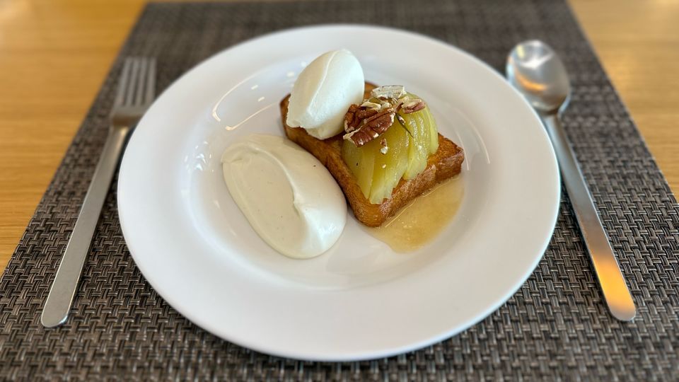 Qantas First Lounge Winter 2023 menu: toasted brioche with rosemary poached pear.