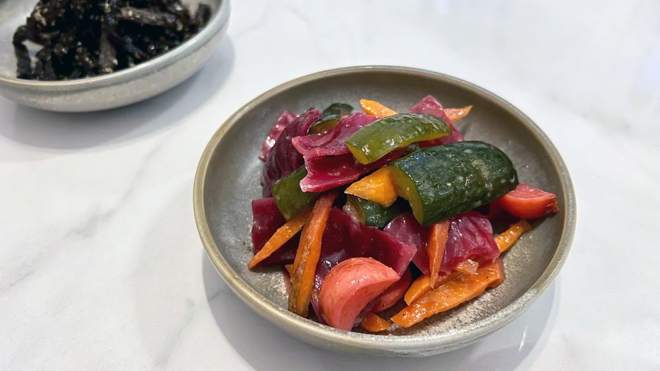 House-made pickles deliver a punchy start to the meal.