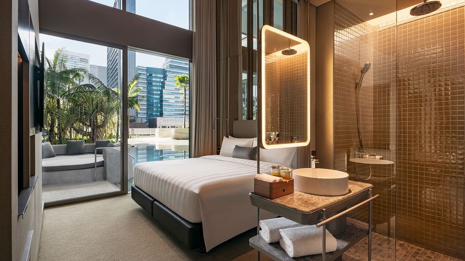 The split-level Beach Club Loft Rooms enjoy direct pool access.