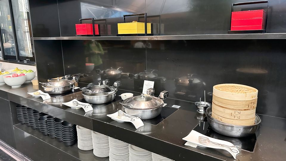 The self-serve selection at The Noodle Bar dining area of Cathay Pacific's The Wing Business lounge.