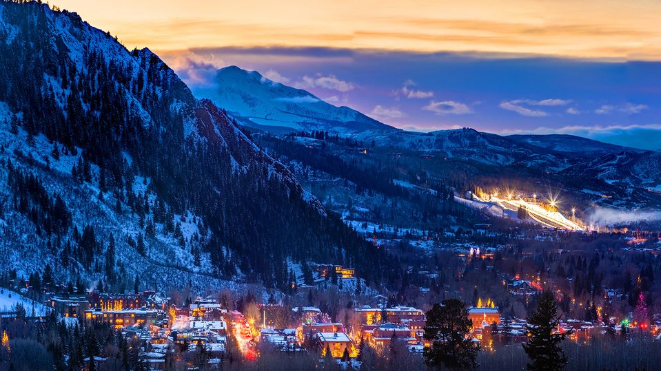 Sunset over Aspen with the Winter X Games in the distance.. Andrew Maguire
