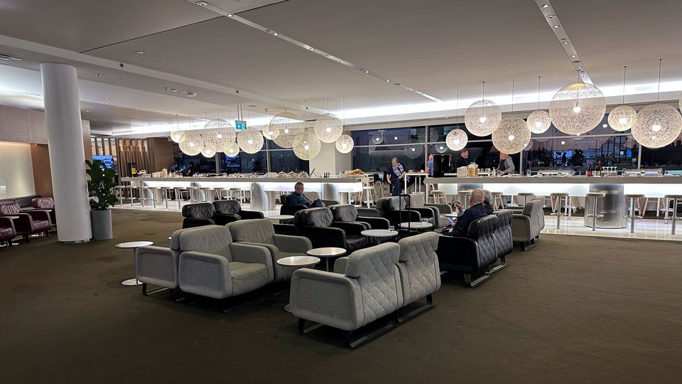 Upright seating and lounges at the heart of Sydney Qantas Business Lounge.