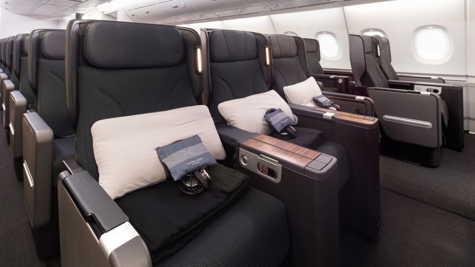 The much darker premium economy cabin of the Qantas 787 and A380.