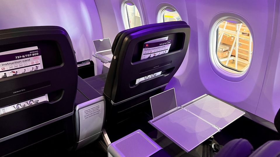 Smart design makes for better use of space on the back of the business class seats, too.