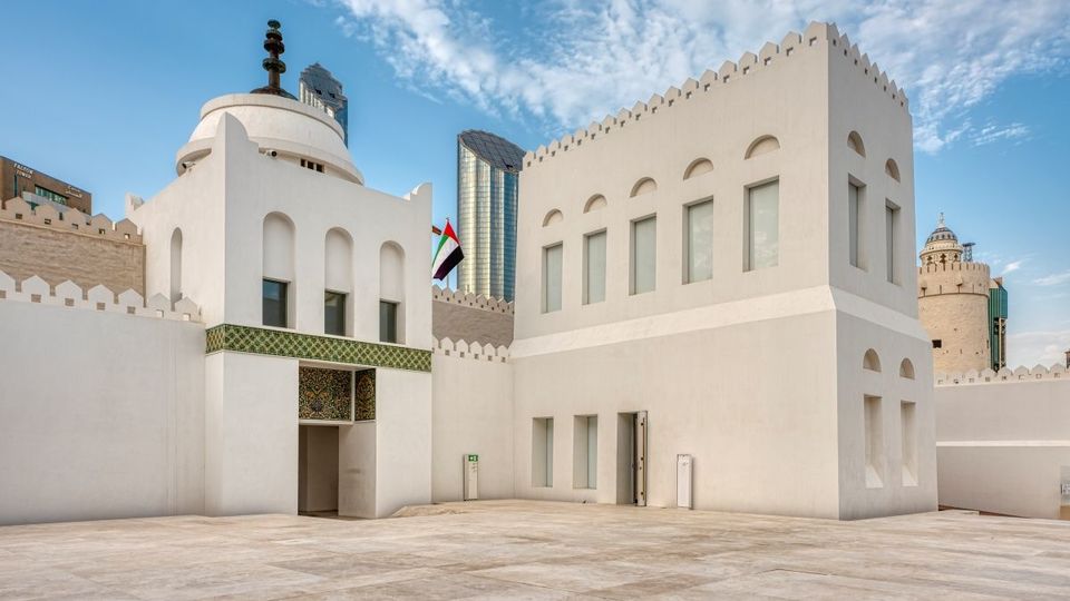 The main gate of Qasr Al Hosn, featuring the fort and watchtower.
