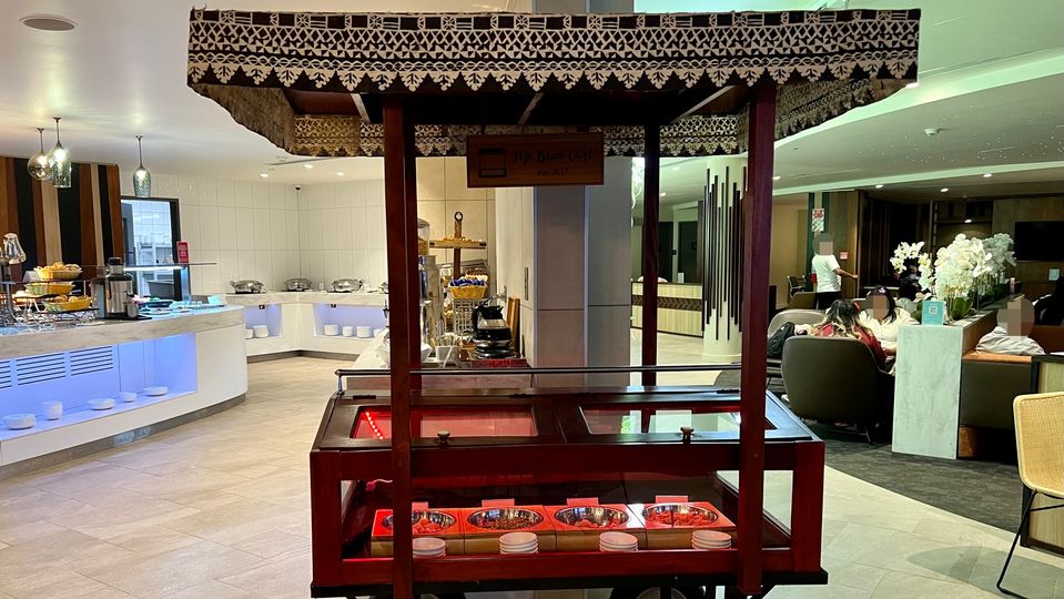 inside the cart are snacks such as deep fried and spiced peas, as well as sweet Penda.