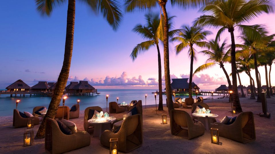 Sunset cocktails at Conrad Bora Bora Nui is an absolute must.