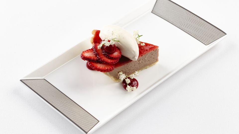 Strawberry tart with ripple cream, chocolate, cherry and candied macadamia.. Steven Woodburn