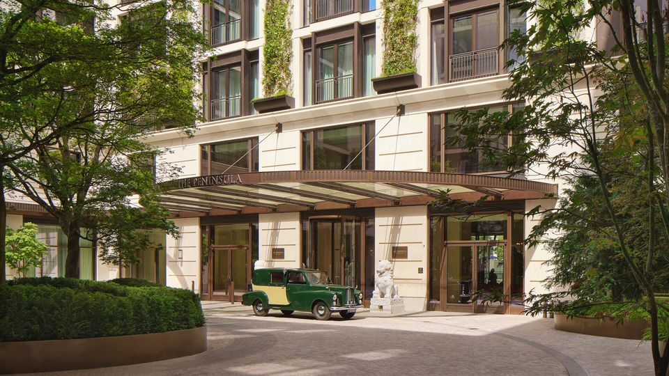 The courtyard is designed in the style of an English garden, with cascading ivy and wisteria.