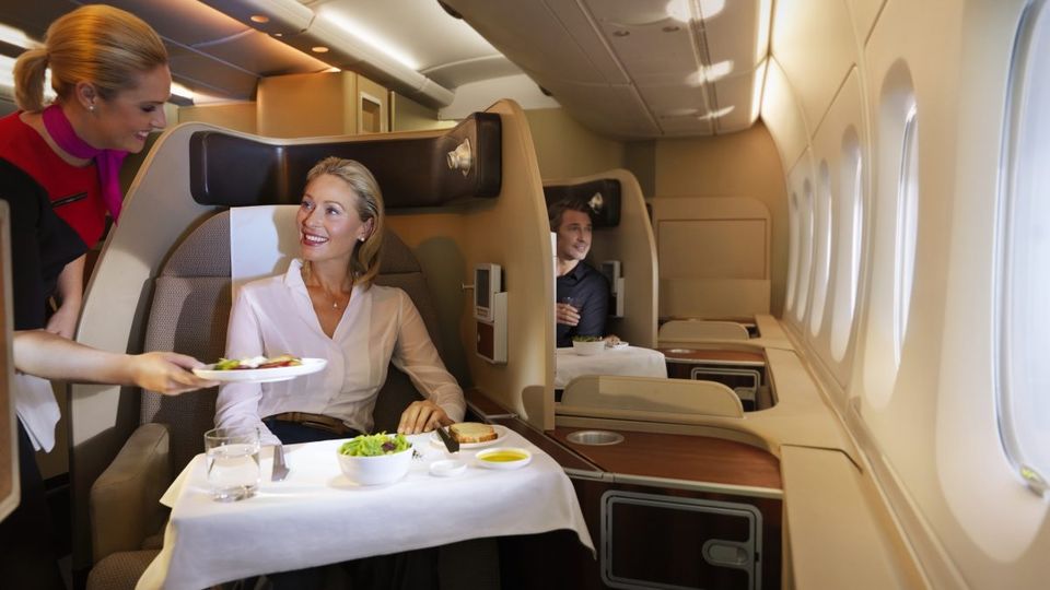 On QF127 and QF128, business class meals are served in the first class cabin.