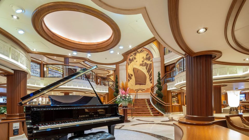 Queen Elizabeth’s triple-height lobby harks back to the golden age of cruising. © Cunard