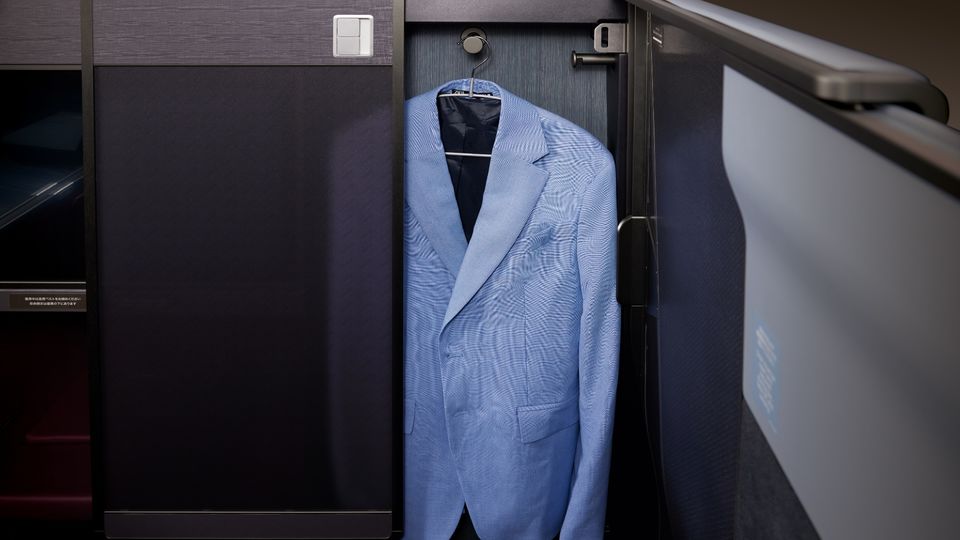 Japan Airlines' A350 business class suites include this handy hidden closet.