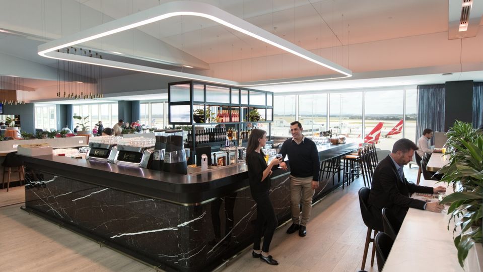 The Qantas Business Lounge Bar includes a tended bar open from noon.