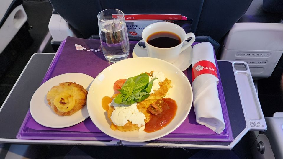Virgin Australia's business class breakfast: corn fritters with goat’s cheese and tomato chutney.