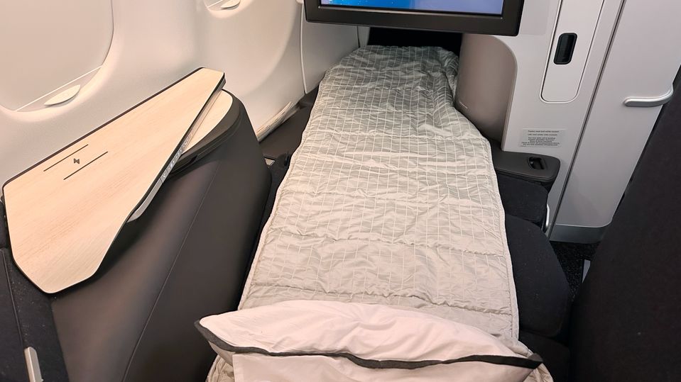 Stretch right out when it's time to sleep on a Qantas Finnair A330 business class flight.