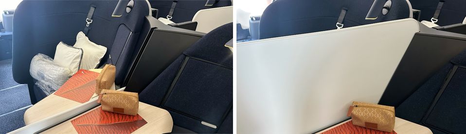 The middle seats of the Qantas Finnair A330 business class cabin.