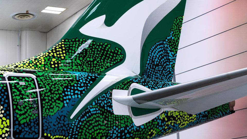 In this one-off design, Qantas' iconic red tail becomes a green tail.