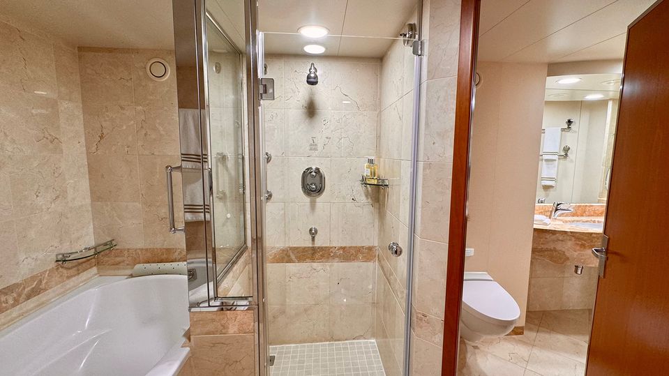 You'll find a full-size shower and tub in the dual-entry bathroom.
