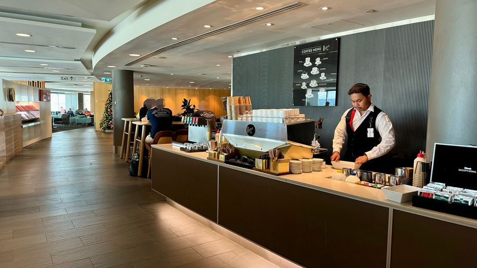 A rare moment of calm between orders at the barista counter.