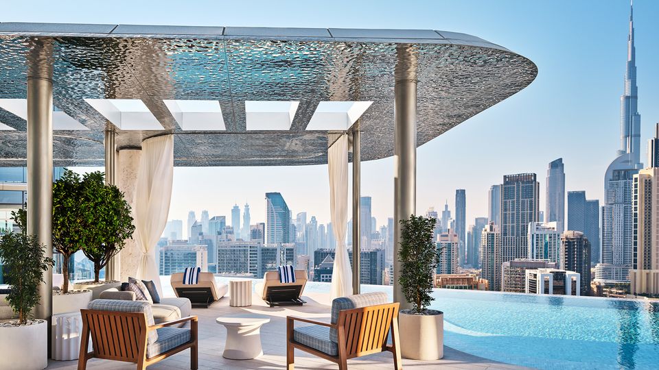 The 30-storey hotel is an infinity pool with views of the city and beyond.