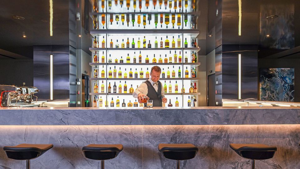 Swap stories of the day's discoveries at Scenic Lounge & Bar.