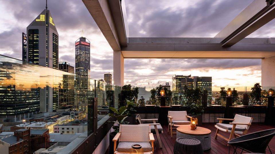 Golden hour at QT Perth's rooftop bar.