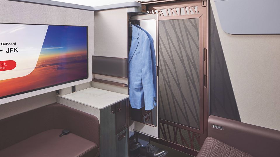 First class flyers are cocooned behind walls up to 1.57m (62”).