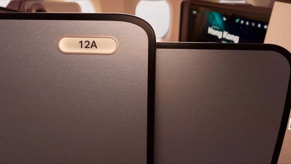 Doors make their debut in Cathay Pacific business class.