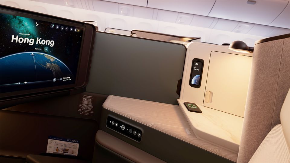 Huzzah! A sliding privacy divider between the middle seats on Cathay Pacific's 777 Aria Suites.