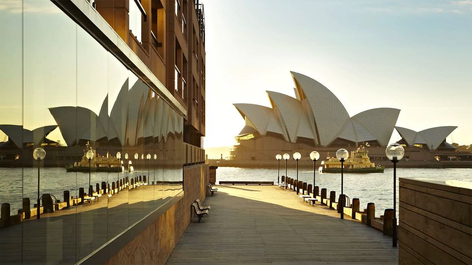 Wake up to unforgettable views of the Sydney Opera House.