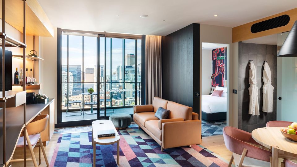 The hotel's colourful Indigo Balcony Suite with bath.