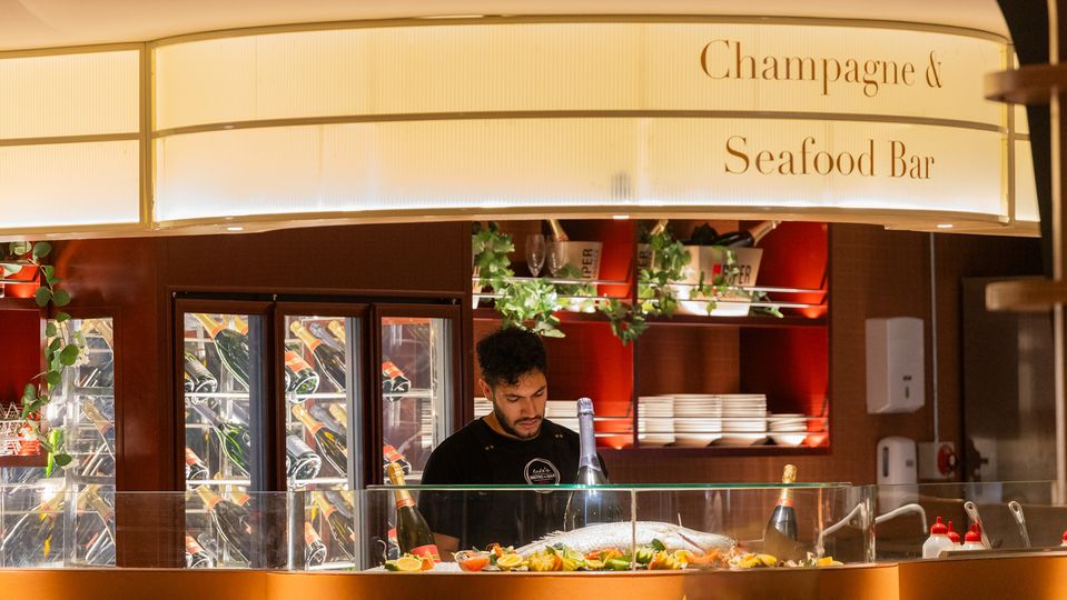 Enjoy a drink at the cocktail bar or alongside the seafood counter.