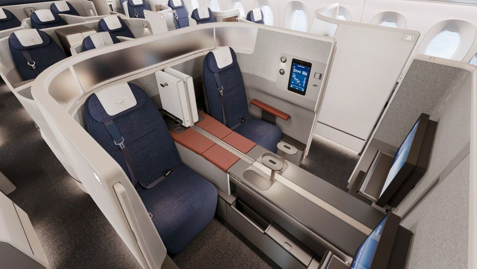 The middle two of the four Allegris business class suites in the first row of the A350 cabin.