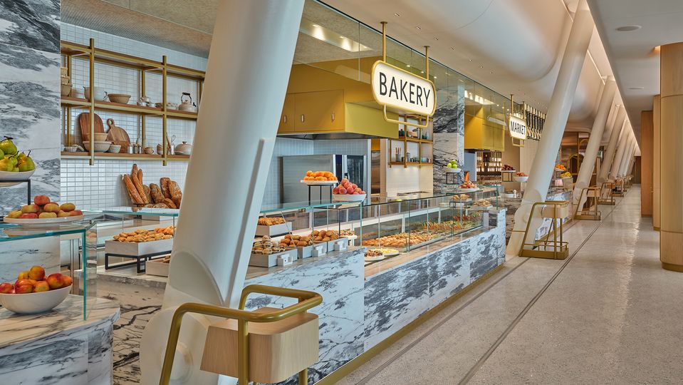 The white-marble Market delicatessen and Bakery counters.