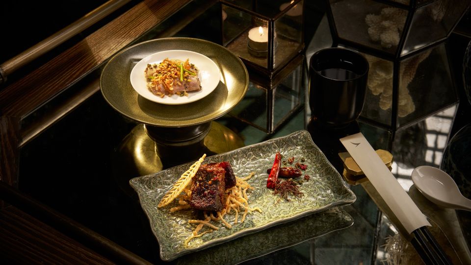 Free-range chicken with black truffle and coriander, and braised wagyu beef with aged tangerine peel.