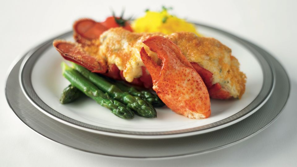When first class menus can feature restaurant-grade lobster, does a hamburger really belong?
