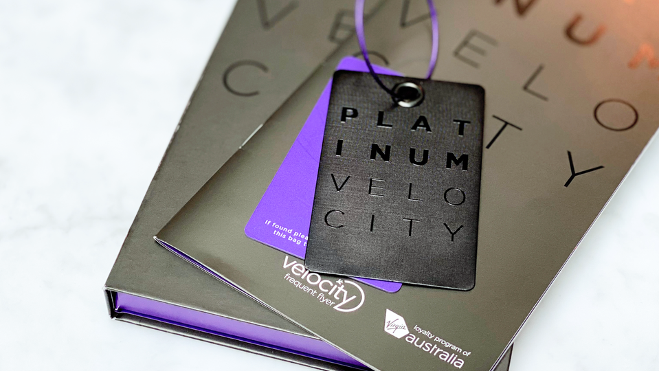Frequent flyers will now have to spend as much as $2,400 for that Velocity Platinum card .