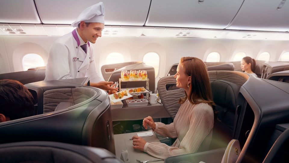 Turkish Airlines business class dining service features 'Flying Chefs'.