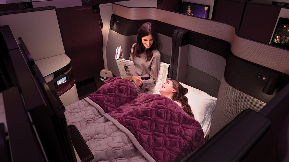 The paired E and F seats effectively convert into a double bed.