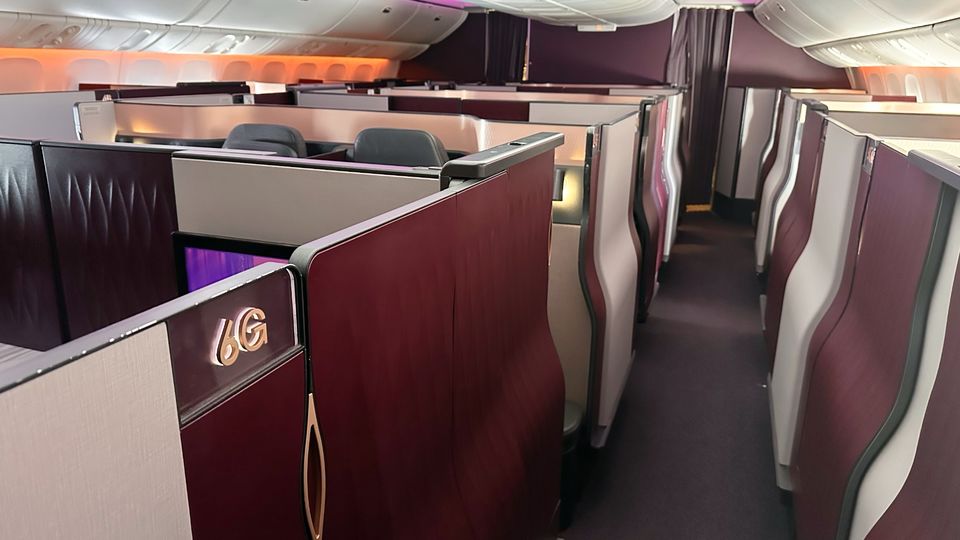 High walls and sliding doors lend privacy to the Qsuite experience.
