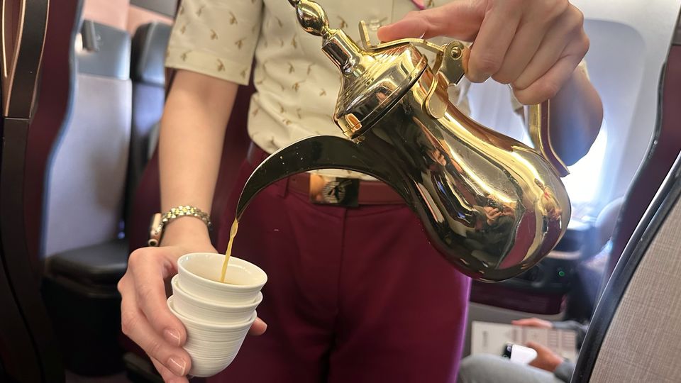 Shortly after take-off, Qsuite passengers are offered a delicious cardamom-tinted Arabic coffee,