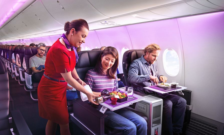 You'll need to do a lot of flying, even in business class, to earn Platinum Plus status.