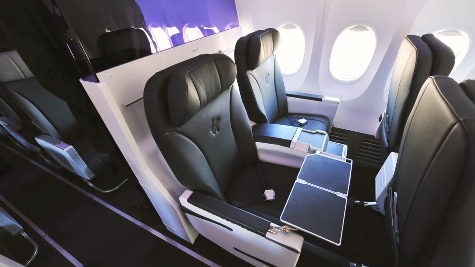 Ditching the bulky floor-mounted cabin divider makes room for more economy seats.